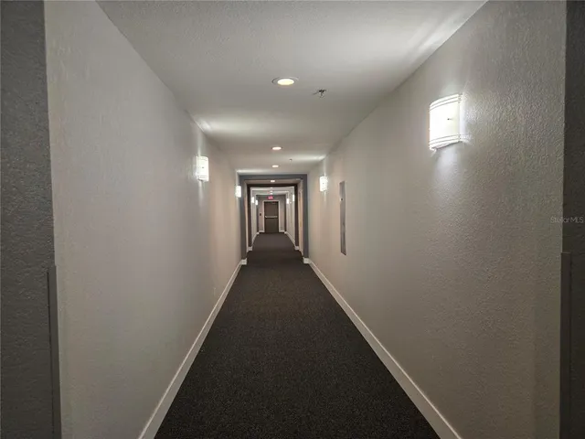 a view of hallway with stairs
