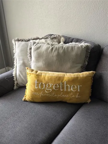 a black and white photo of a couch