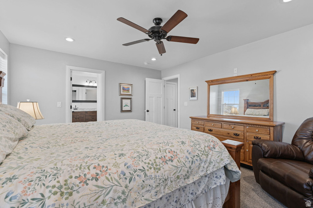 75 North 100th Street West Fillmore, UT 84631 - Photo 13 of 62 Bedroom featuring dark colored carpet, a ceiling fan, recessed lighting, and ensuite bath