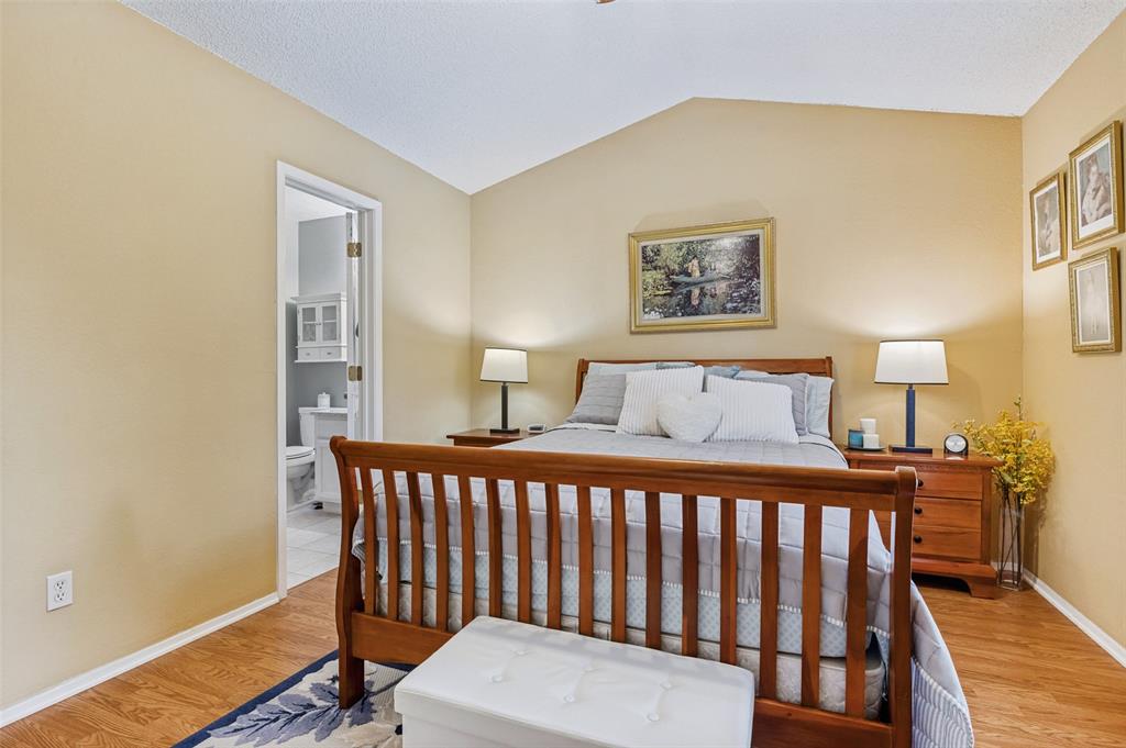 22 Abbey Road Euless, TX 76039 - Photo 13 of 20 Primary bedroom with attached bathroom