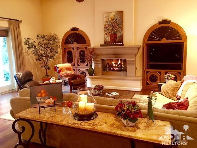 40278 Rancho Palmeras Rancho Mirage, CA 92270 - Photo 14 of 68 a living room with furniture and a fireplace