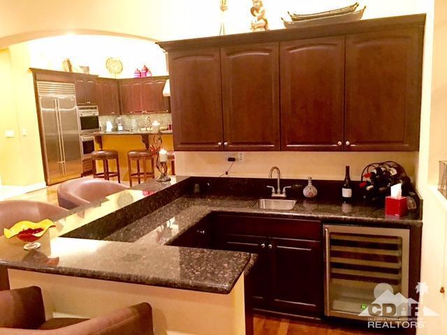 40278 Rancho Palmeras Rancho Mirage, CA 92270 - Photo 15 of 68 a kitchen with a sink and a stove