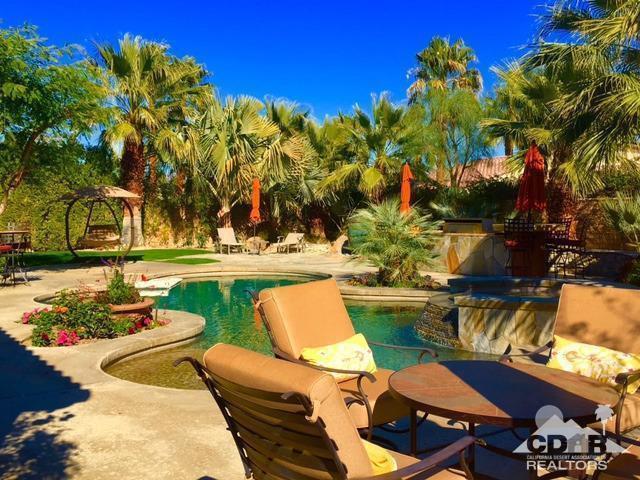 40278 Rancho Palmeras Rancho Mirage, CA 92270 - Photo 20 of 68 a view of a swimming pool with a patio