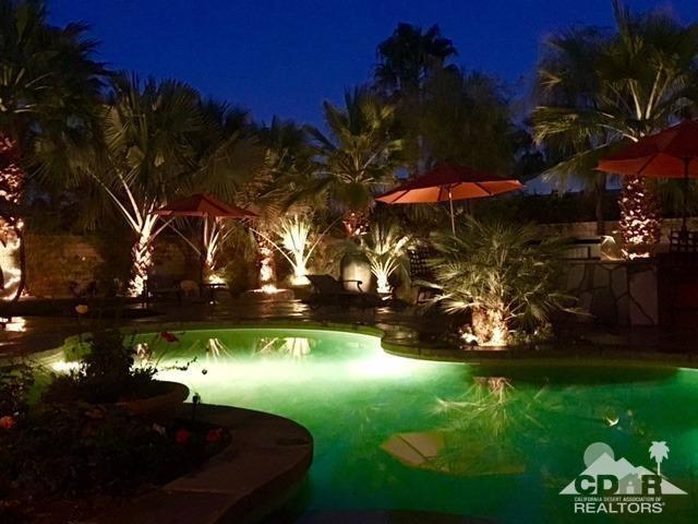 40278 Rancho Palmeras Rancho Mirage, CA 92270 - Photo 21 of 68 a view of a back yard of the house and green space