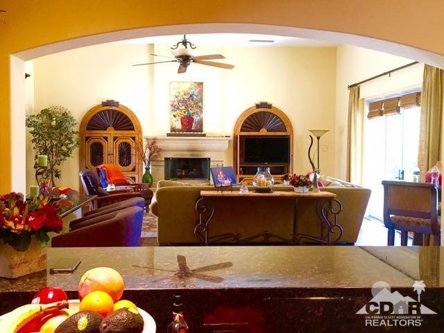 40278 Rancho Palmeras Rancho Mirage, CA 92270 - Photo 22 of 68 a living room with furniture and a fireplace