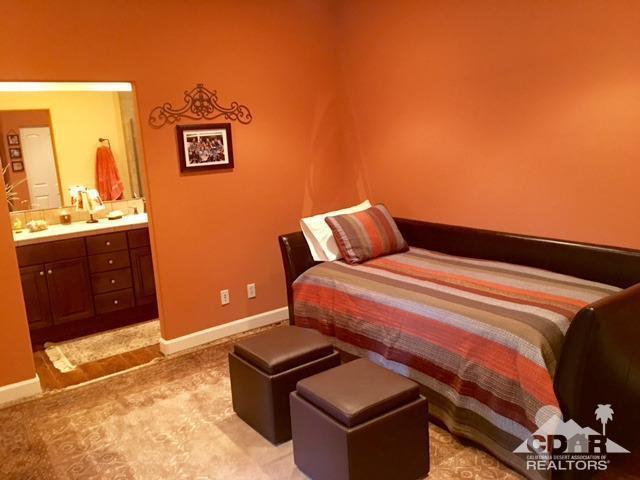 40278 Rancho Palmeras Rancho Mirage, CA 92270 - Photo 24 of 68 a bedroom with a bed and cabinets