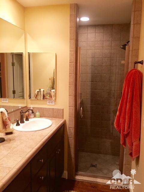 40278 Rancho Palmeras Rancho Mirage, CA 92270 - Photo 28 of 68 a bathroom with a sink a toilet and shower