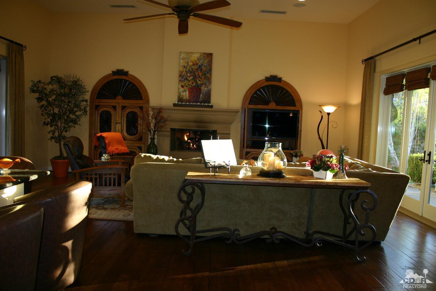 40278 Rancho Palmeras Rancho Mirage, CA 92270 - Photo 47 of 68 a living room with fireplace furniture and a fireplace