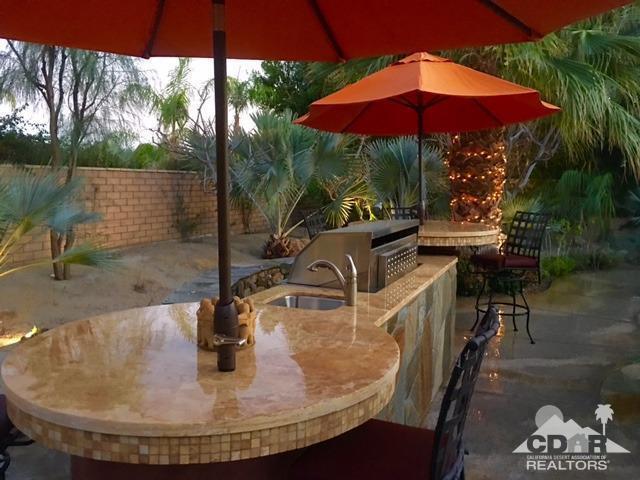 40278 Rancho Palmeras Rancho Mirage, CA 92270 - Photo 49 of 68 a view of a swimming pool with a patio