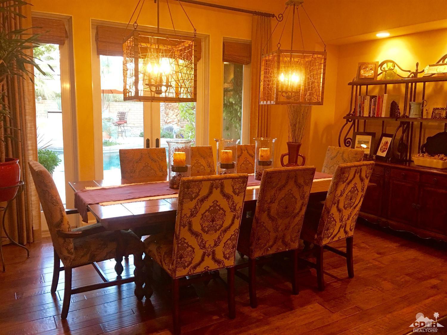 40278 Rancho Palmeras Rancho Mirage, CA 92270 - Photo 8 of 68 a view of a dining room with furniture and wooden floor