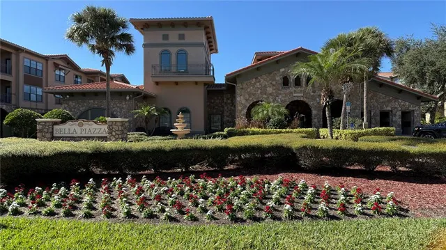 a view of a house with swimming pool and porch