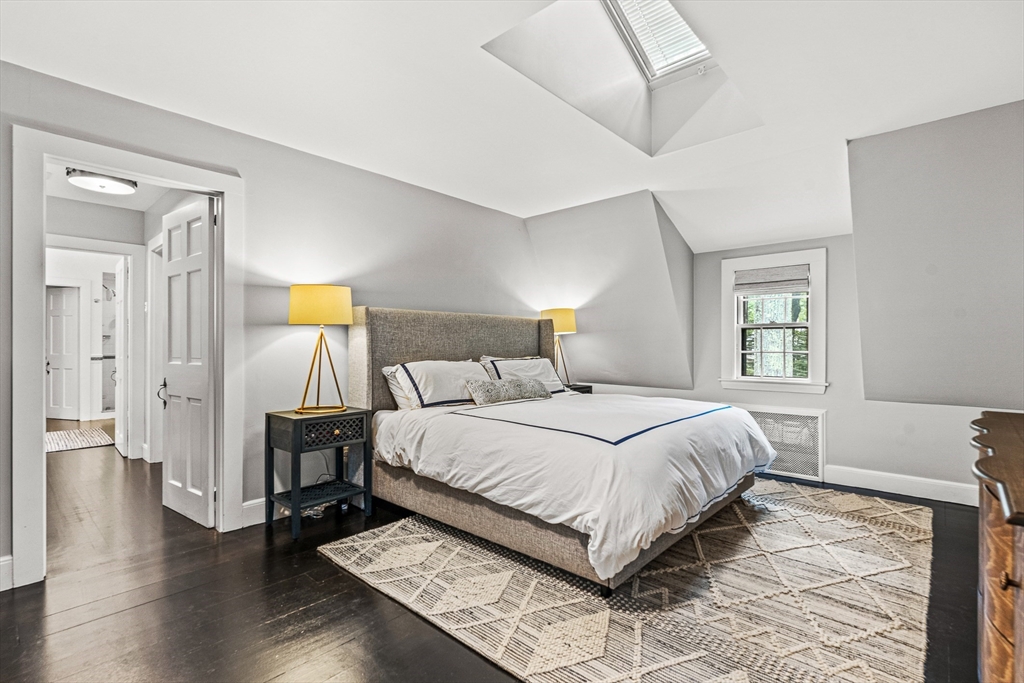 19 Pelham Road Weston, MA 02493 - Photo 11 of 17 a bedroom with a bed and wooden floor