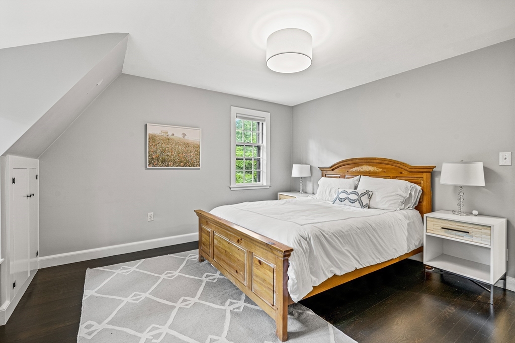 19 Pelham Road Weston, MA 02493 - Photo 12 of 17 a bedroom with a bed and a window
