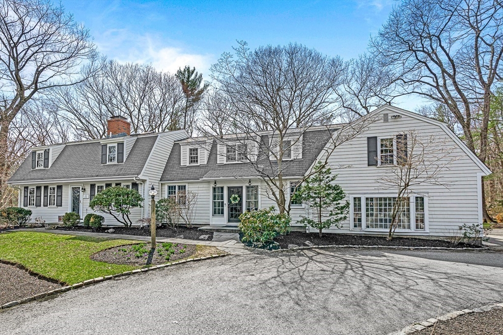 19 Pelham Road Weston, MA 02493 - Photo 16 of 17 a front view of a house with a yard