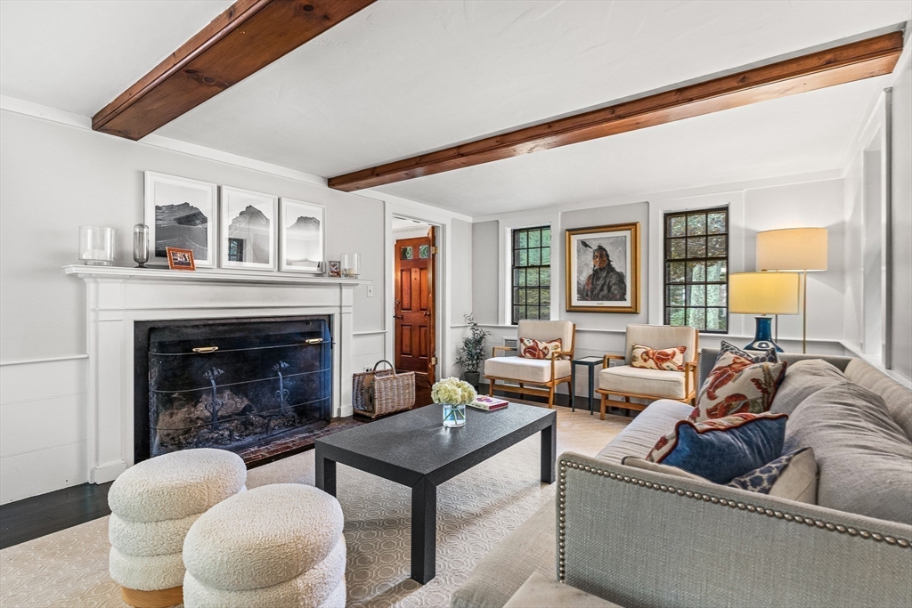 19 Pelham Road Weston, MA 02493 - Photo 7 of 17 a living room with furniture and a fireplace