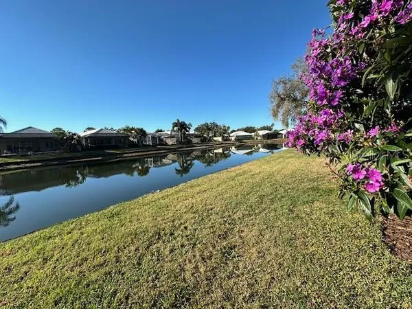 a view of a lake with outdoor space