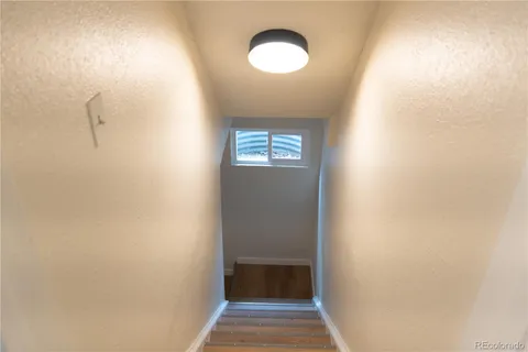 a view of a hallway with front door