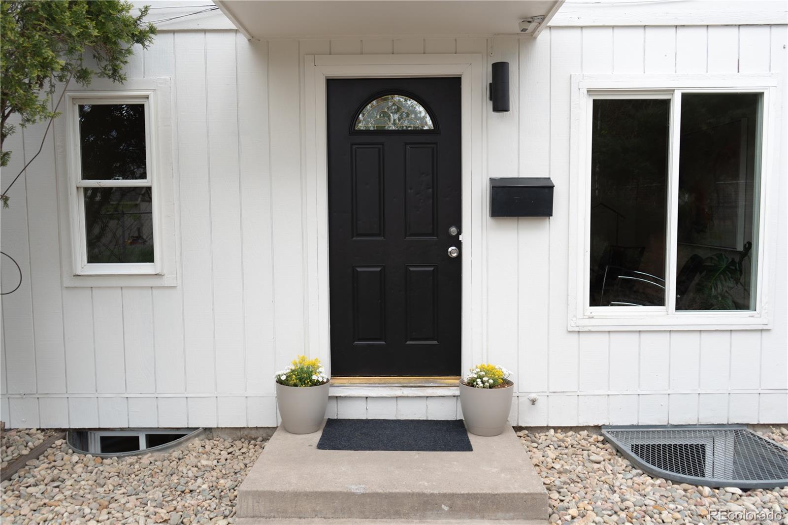 3073 West Center Avenue, Unit C Denver, CO 80219 - Photo 2 of 34 a view of entryway of the house