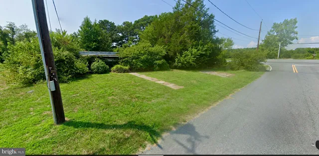 a view of a backyard with a garden