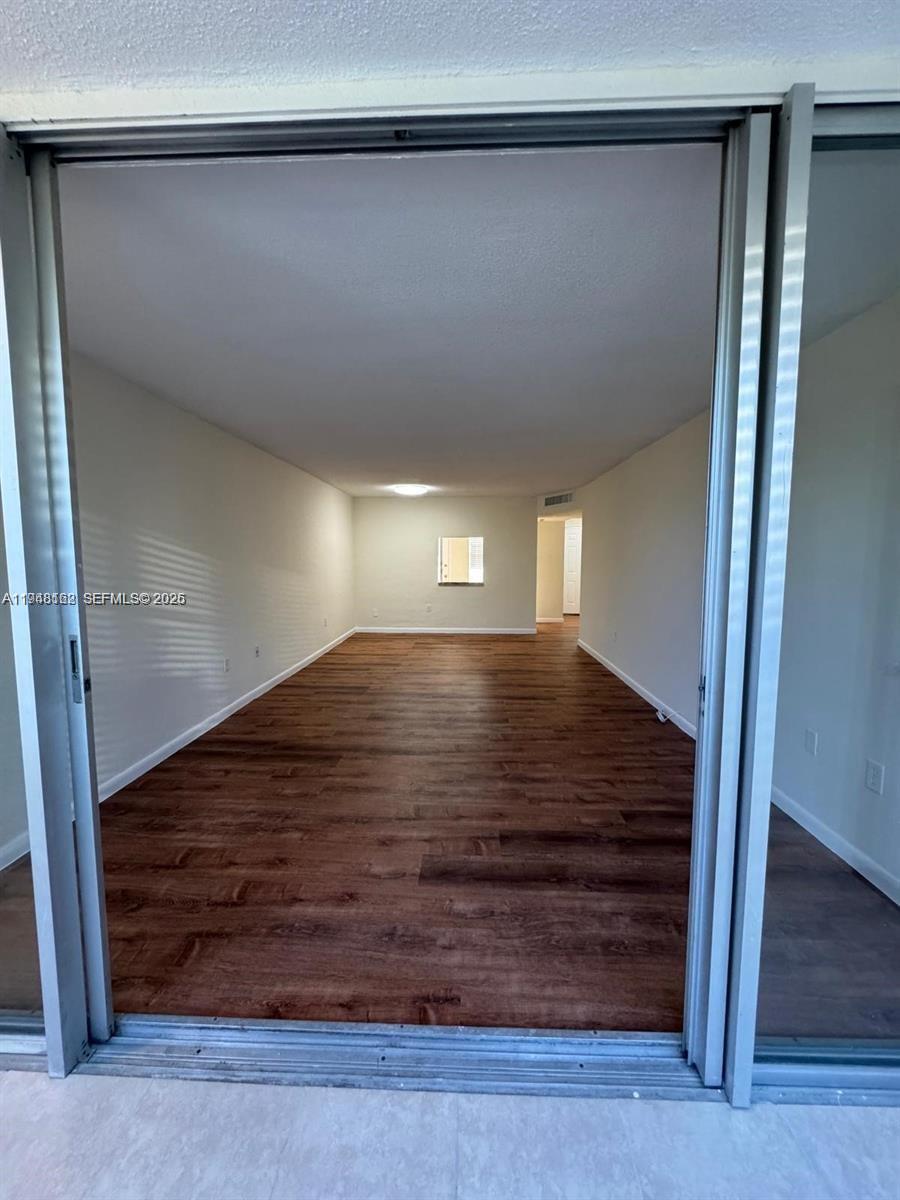 1201 Northeast 191st Street, Unit G313 Miami, FL 33179 - Photo 10 of 15 a view of entryway
