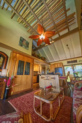 a dining room with a table and chairs