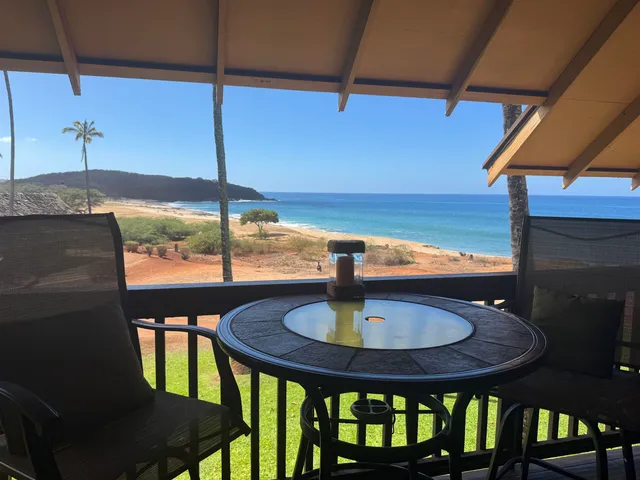 a view of mountain with sunset