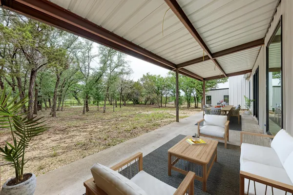 a view of yard with patio