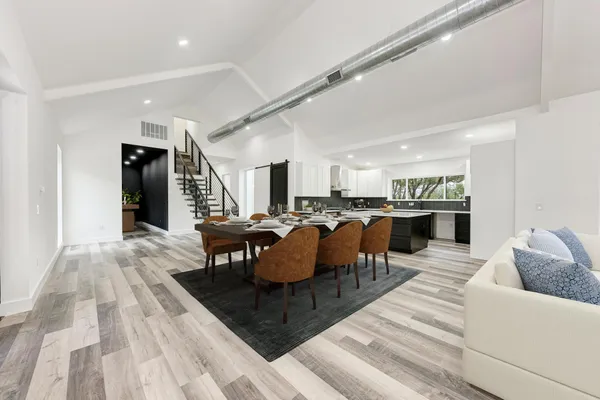 a living room with furniture and a table