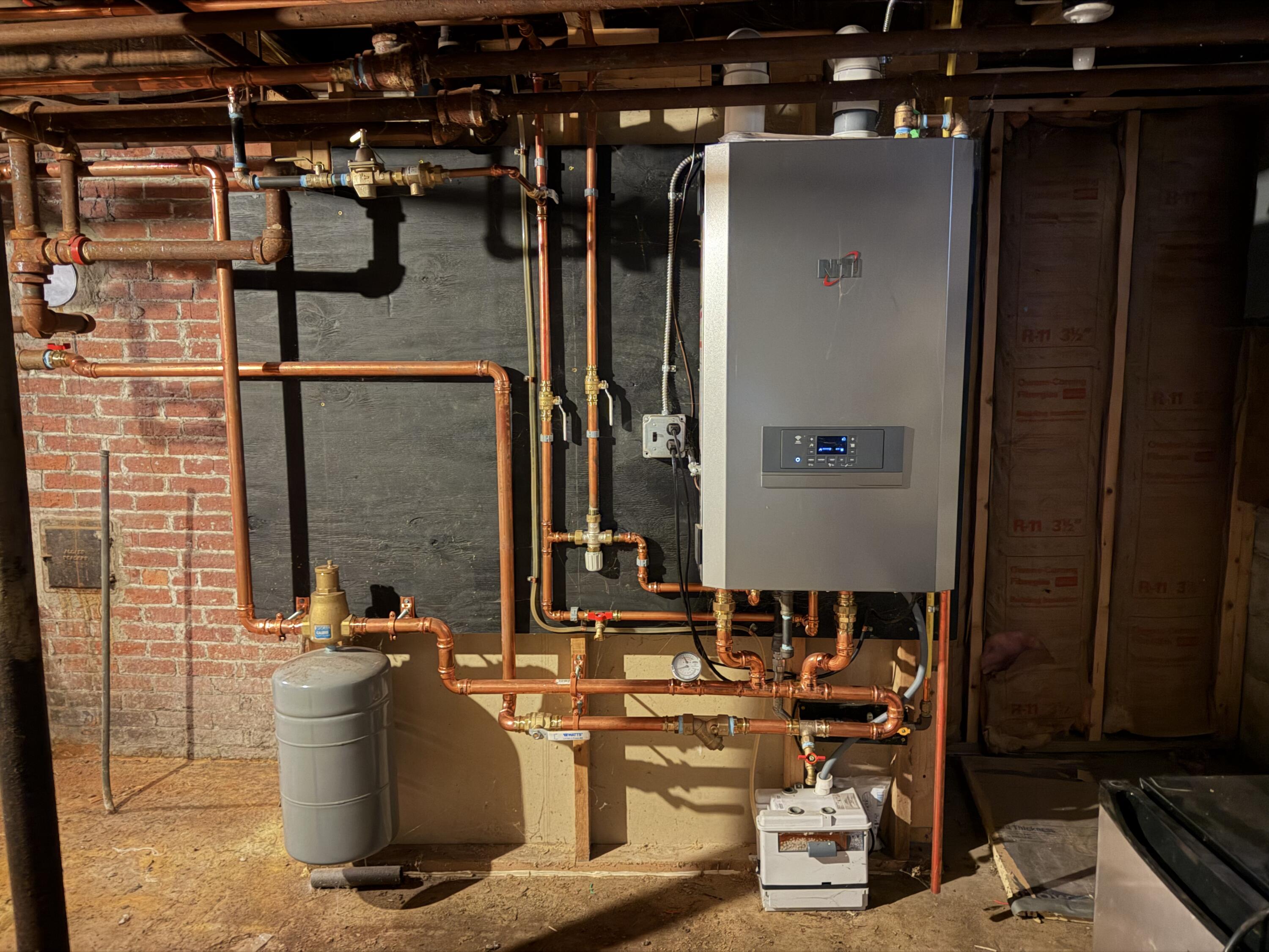 12 Charles Street Milo, ME 04463 - Photo 34 of 40 new heating system