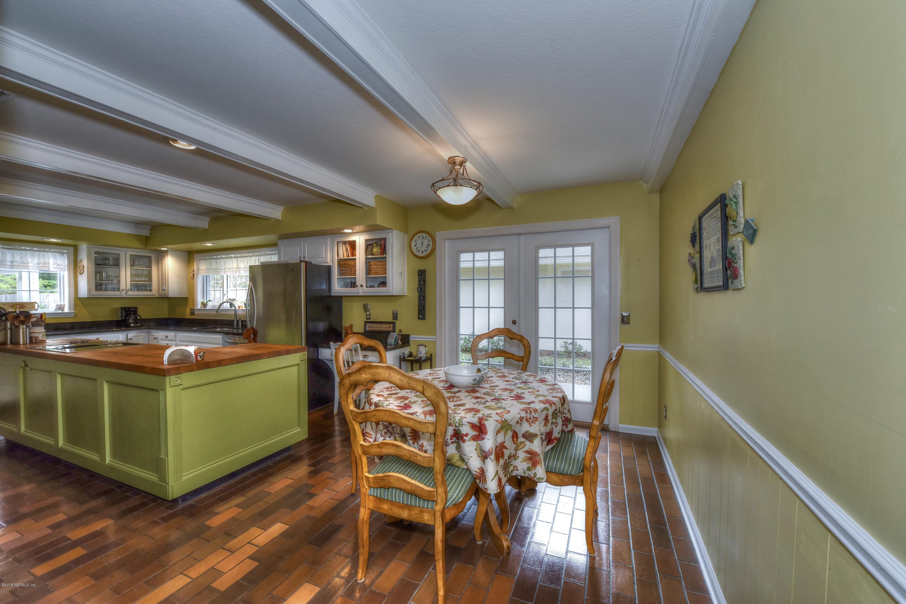 9641 Beauclerc Bluff Road Jacksonville, FL 32257 - Photo 14 of 42 a view of a dining room with furniture window and wooden floor