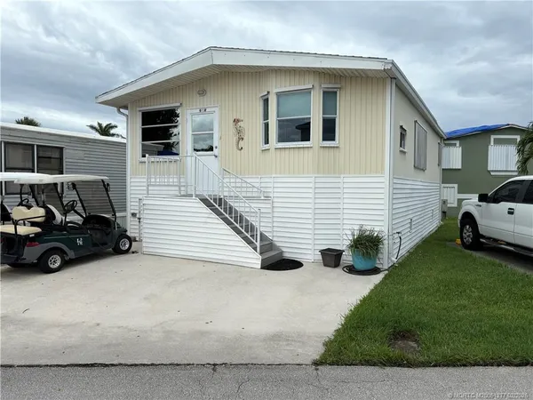 a view of a house with a patio