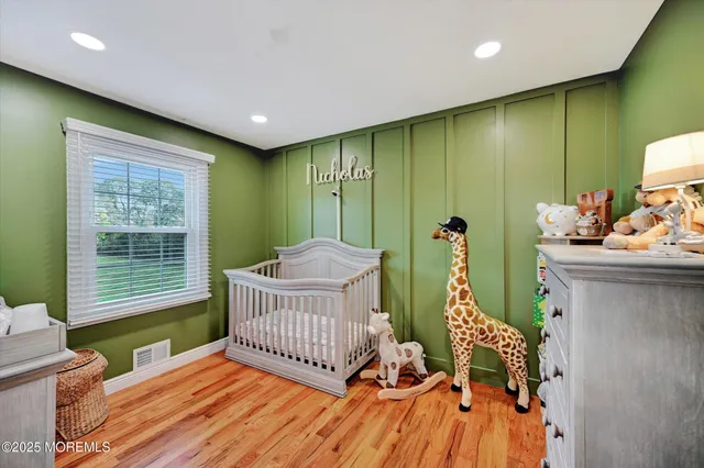 a view of a livingroom with furniture and staircase