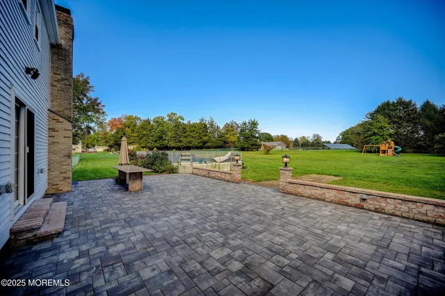a view of a park with large trees