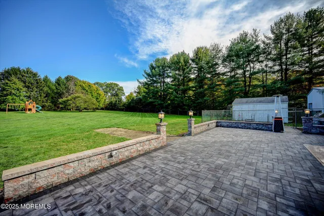 a house with trees in the background
