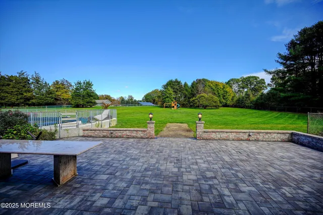 a view of a bench with a lake view
