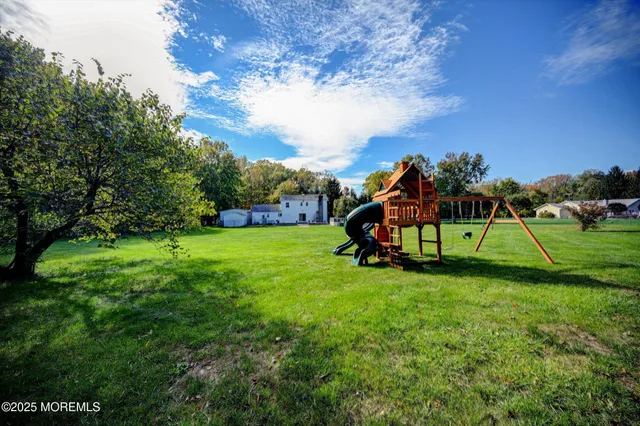 a view of a park with a slide