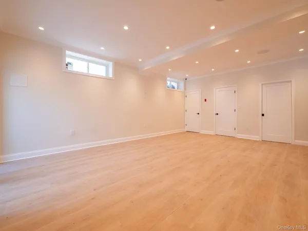 an empty room with ceiling fan