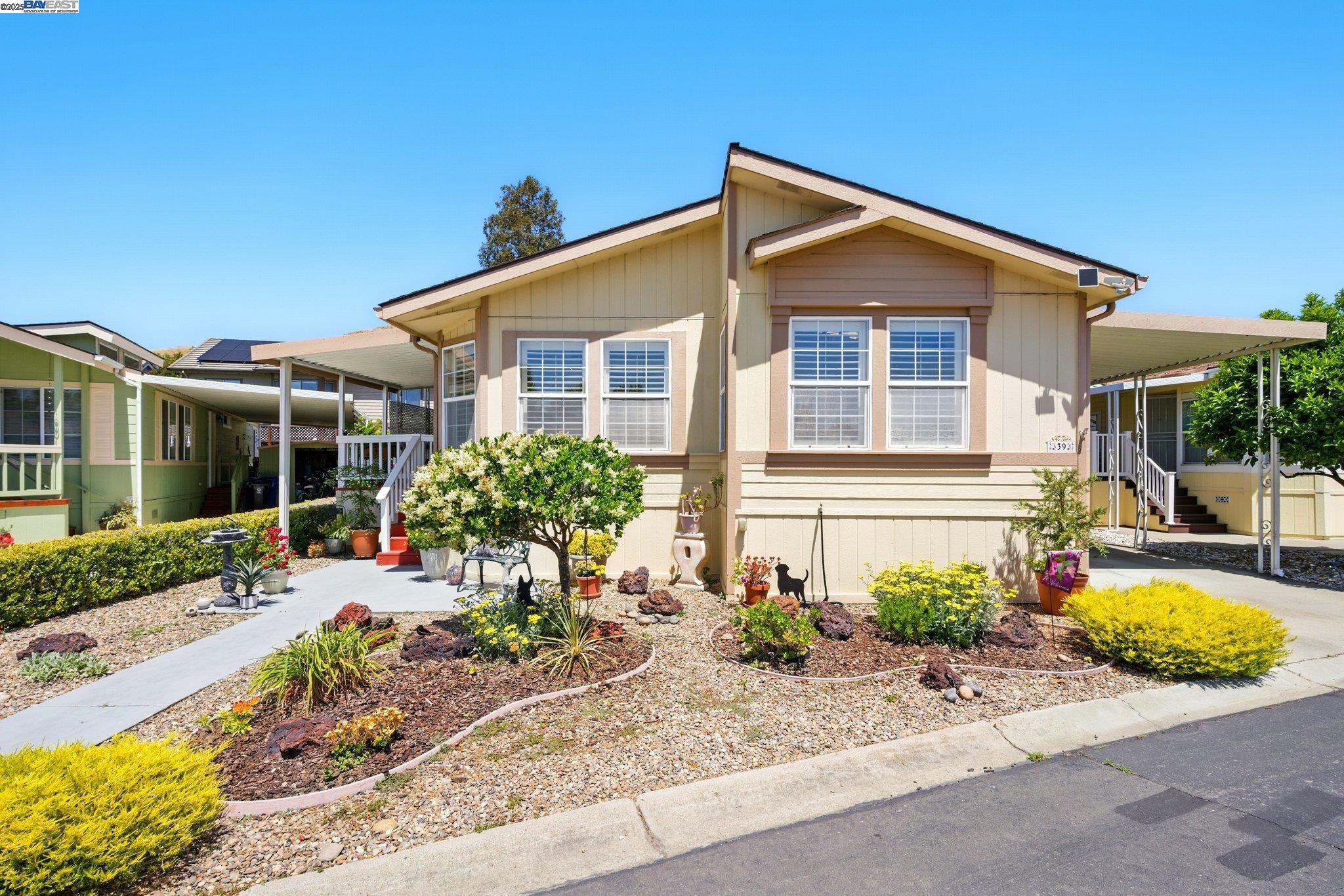 a front view of a house with garden