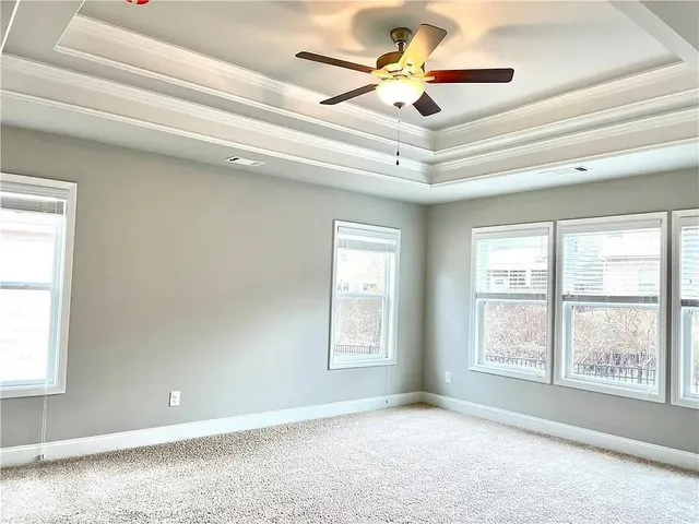 a view of an empty room and window