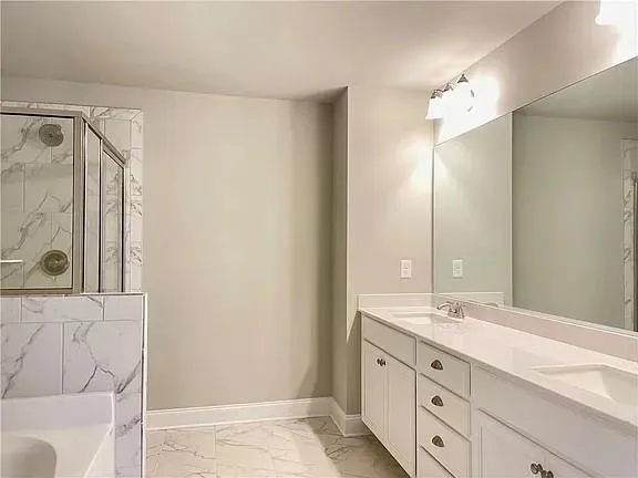 a bathroom with a double vanity sink and a mirror