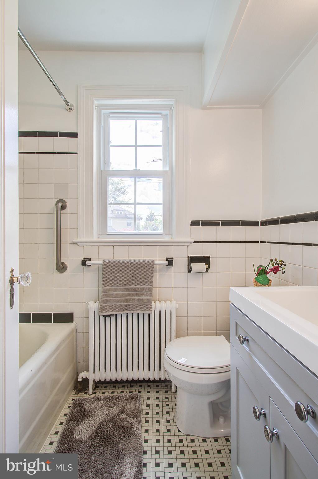 2031 Glen Ross Road Silver Spring, MD 20910 - Photo 22 of 41 Bathroom 1 w/ vintage tile, newer vanity
