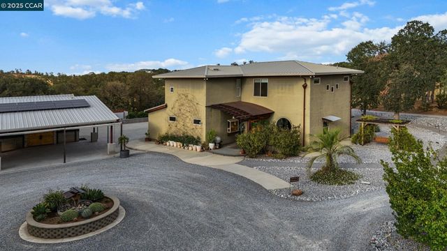 a view of a house with a patio
