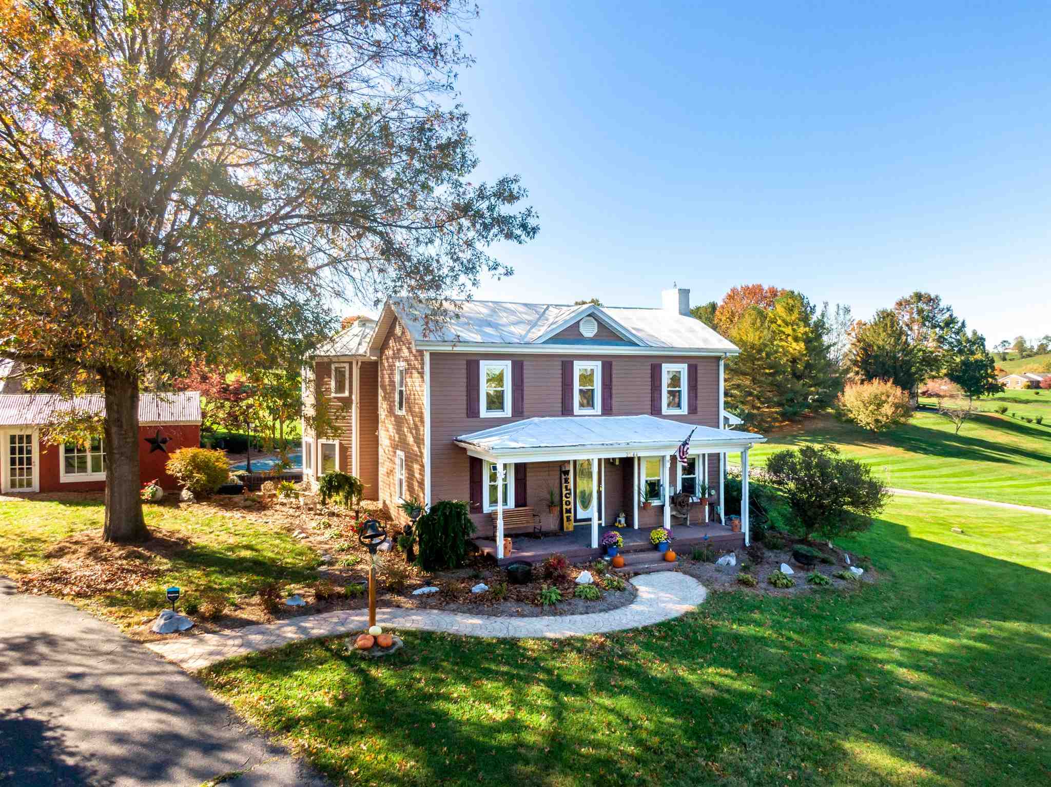2344 Spring Hill Road Staunton, VA 24401 - Photo 50 of 74 a front view of a house with swimming pool garden and patio