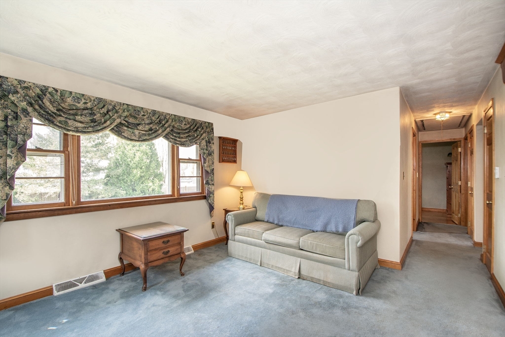 6 Clover Road Holbrook, MA 02343 - Photo 10 of 26 a living room with furniture and a window