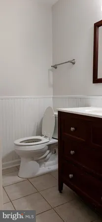 a bathroom with a toilet and a sink