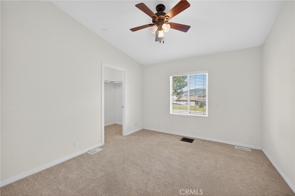 39230 Grassy Road Temecula, CA 92592 - Photo 13 of 33 a view of an empty room with a window