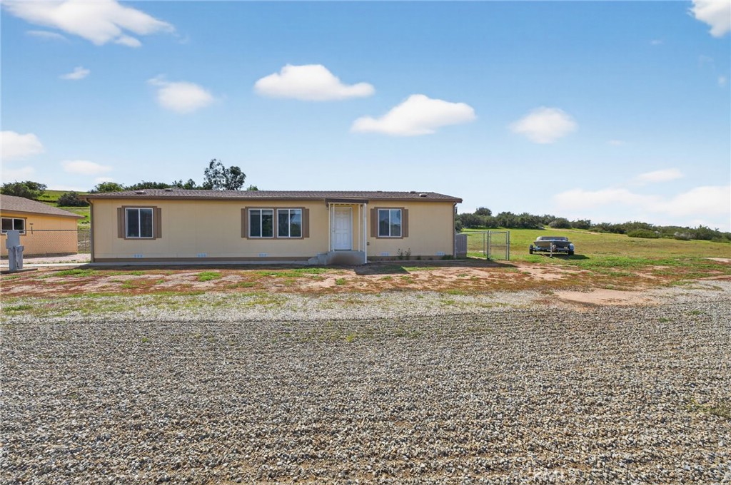 39230 Grassy Road Temecula, CA 92592 - Photo 23 of 33 a view of a big room with a kitchen