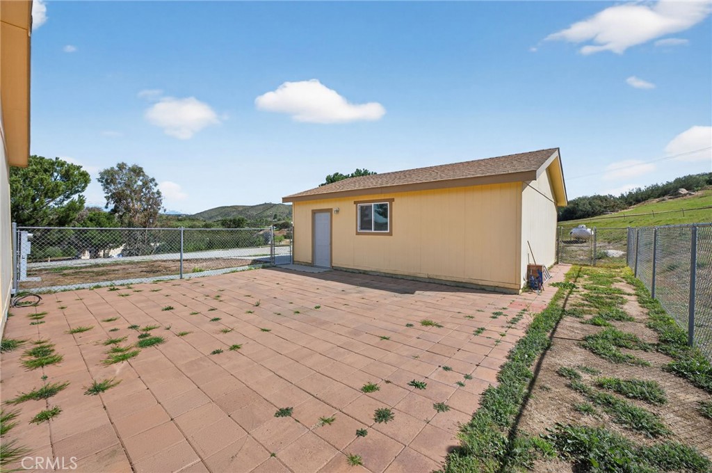 39230 Grassy Road Temecula, CA 92592 - Photo 24 of 33 a view of backyard of the house
