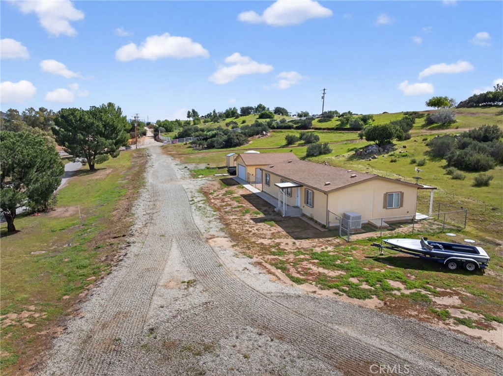 39230 Grassy Road Temecula, CA 92592 - Photo 30 of 33 a car parked on the side of the road