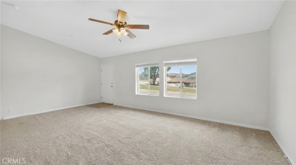39230 Grassy Road Temecula, CA 92592 - Photo 6 of 33 a view of an empty room with a window